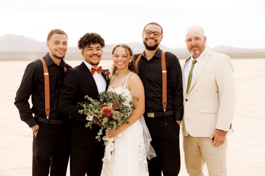 brides family smiling at the camera
