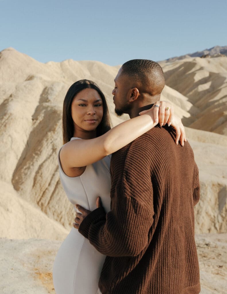 couple hugging at zabriskie point