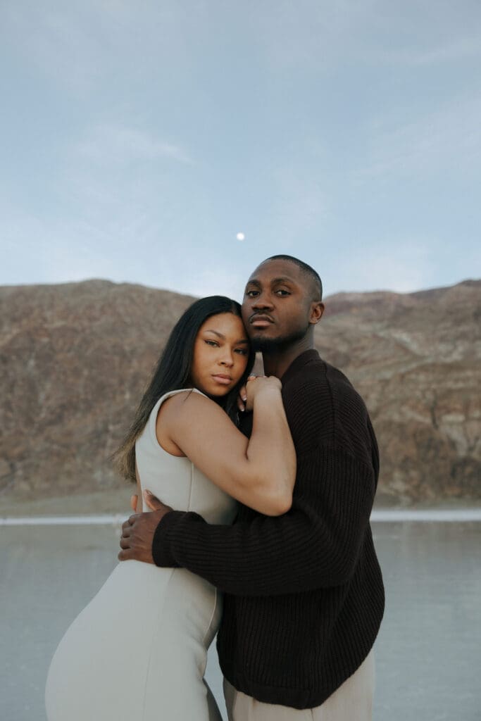 couple hugging under the moon