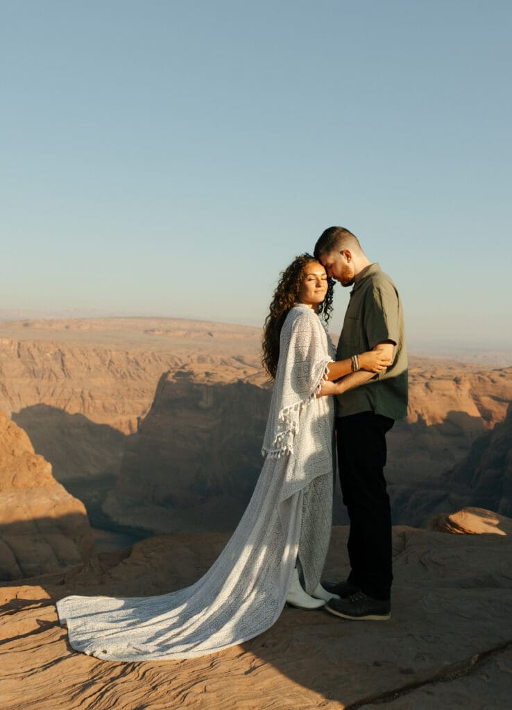 couple hugging at horseshoe bend