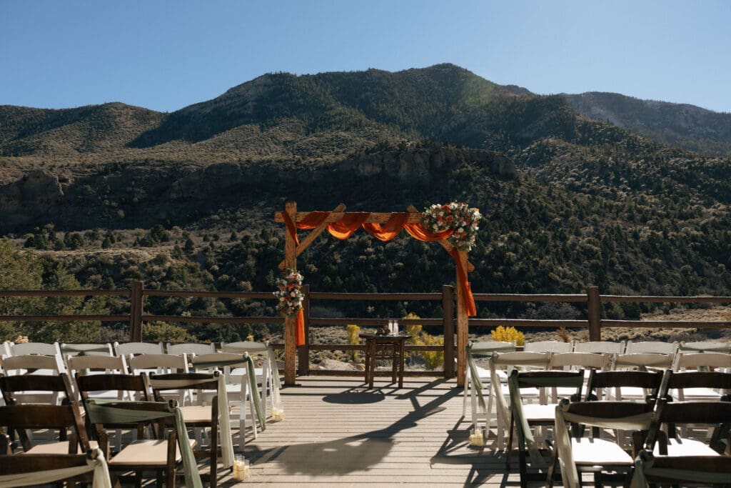 wedding arch and chairs set up