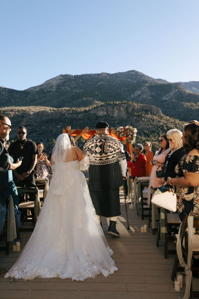 dad walking bride down the aisle