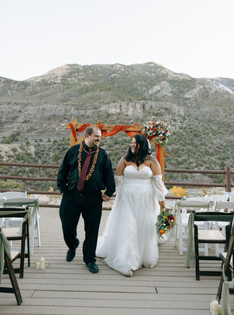 bride and groom walking back down the aisle