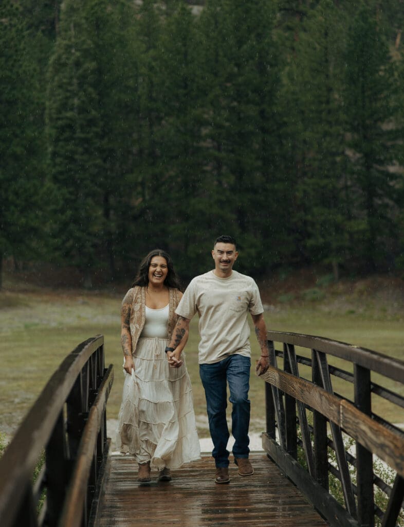 couple walking down bridge at lee meadows in las vegas