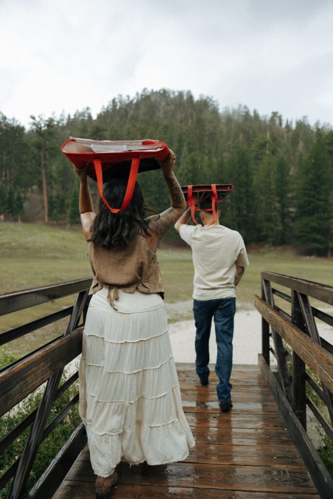 couple covering from the rain at mt charleston