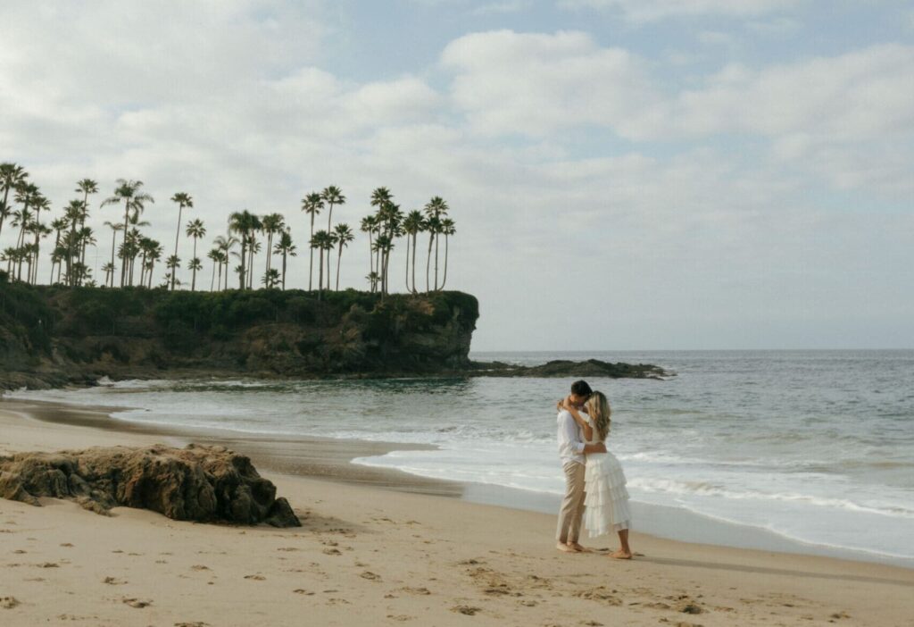 couple hugging at crescent bay beach