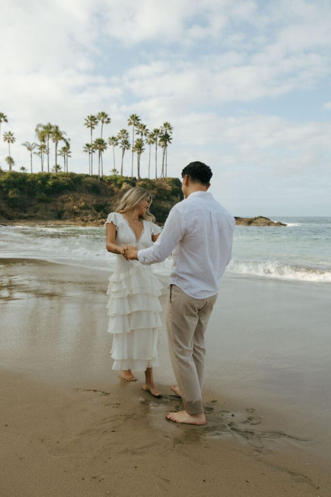 couple playing at the beach