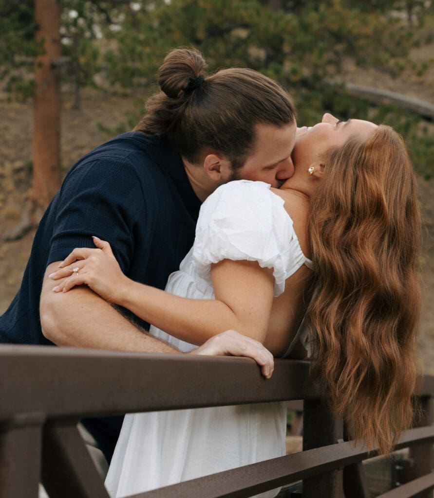 couple kissing on the bridge at mt charleston