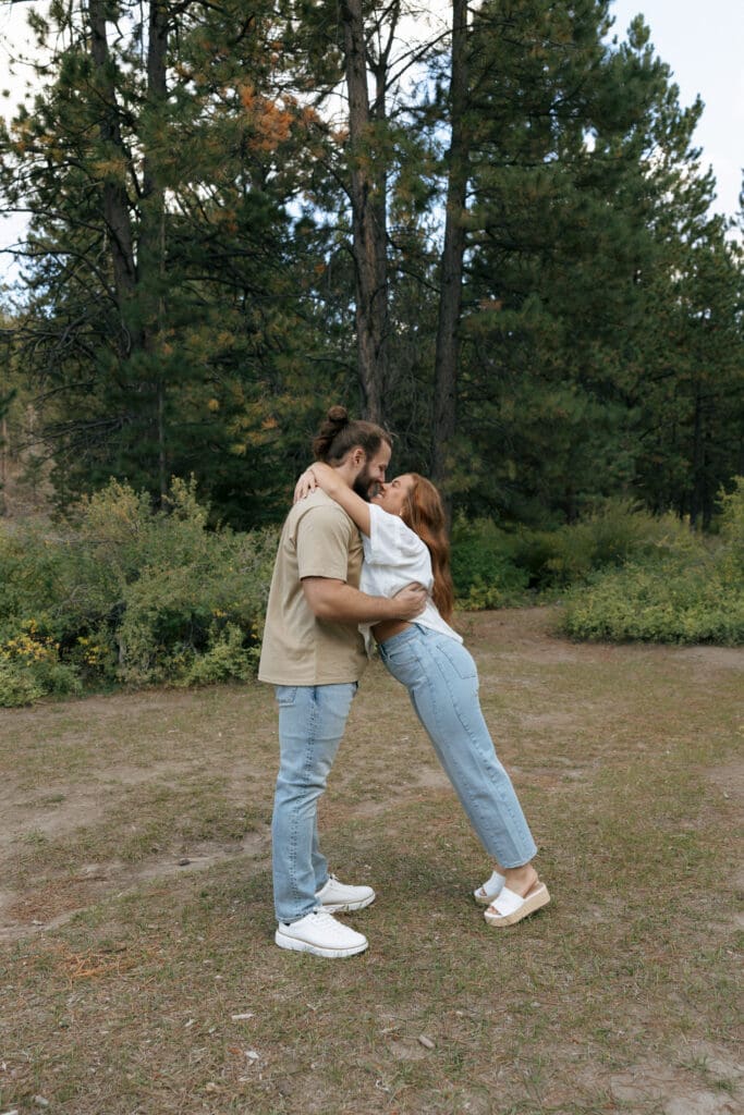 couple in forrest hugging
