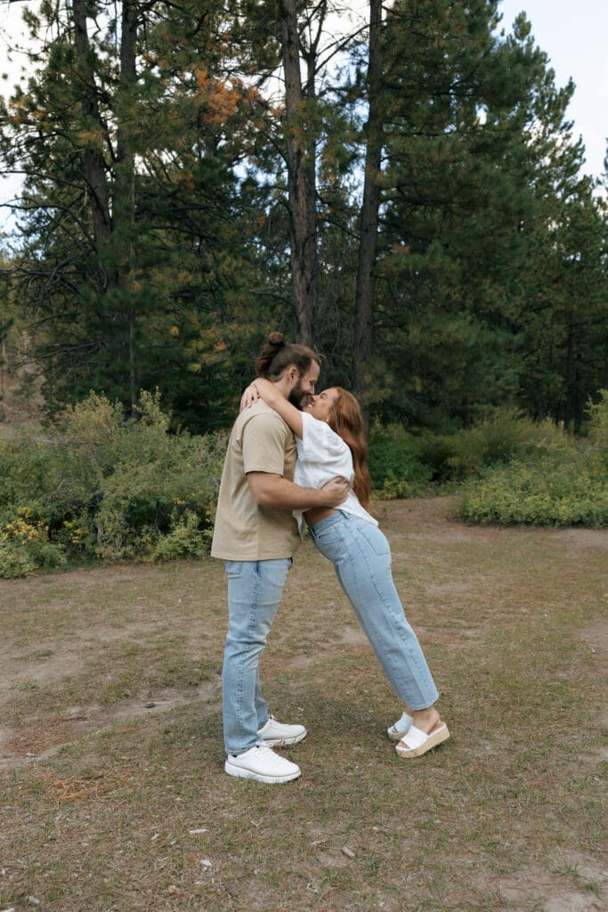 couple in forrest hugging
