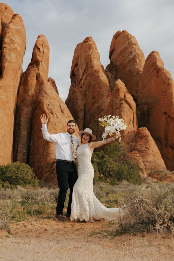 bride and groom celebrating with west coast elopement photographer