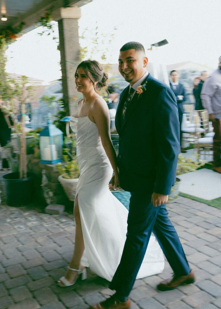 bride and groom walking down aisle