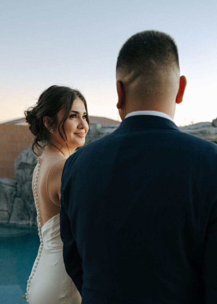 bride looking at groom