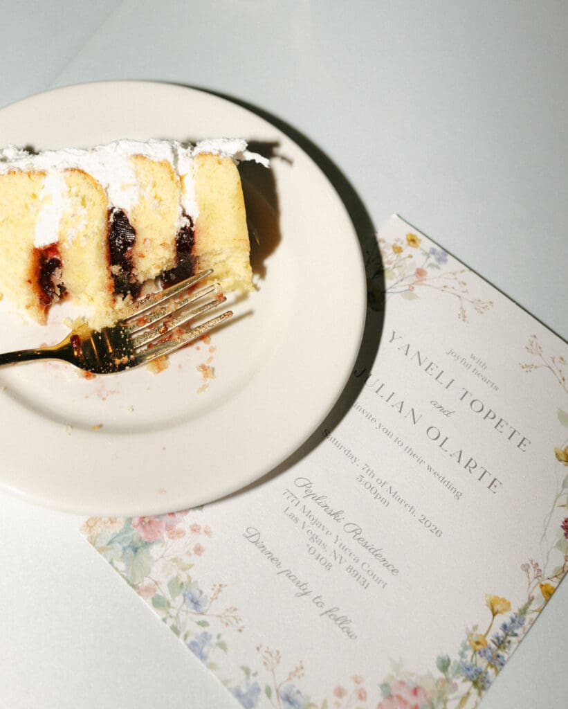 eaten cake with wedding invitation
