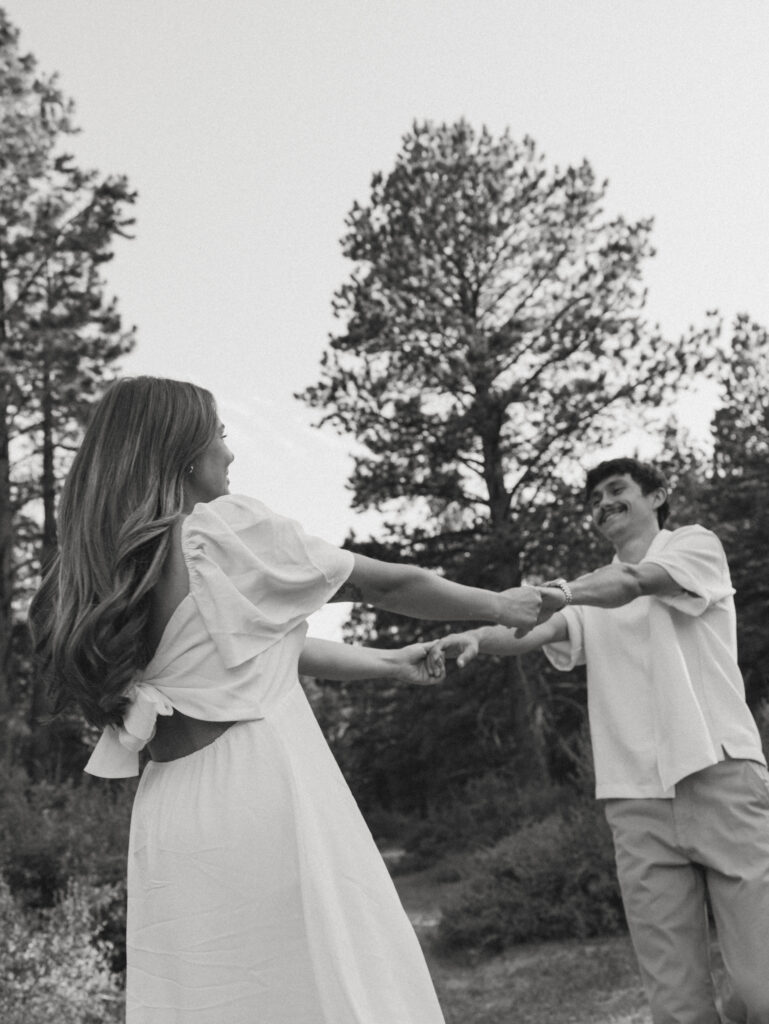 black and white image of couple dancing at lee meadows