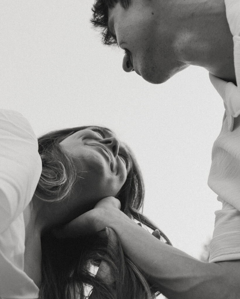 low angle of couple with negative space around them
