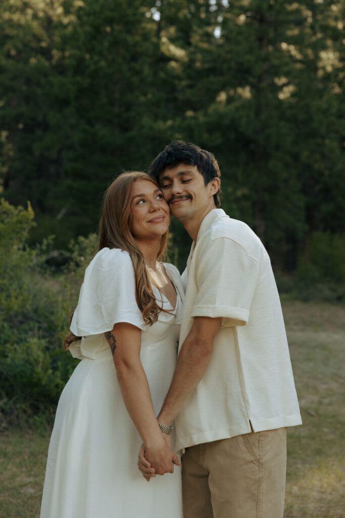 couple posing for cinematic engagement photos in las vegas