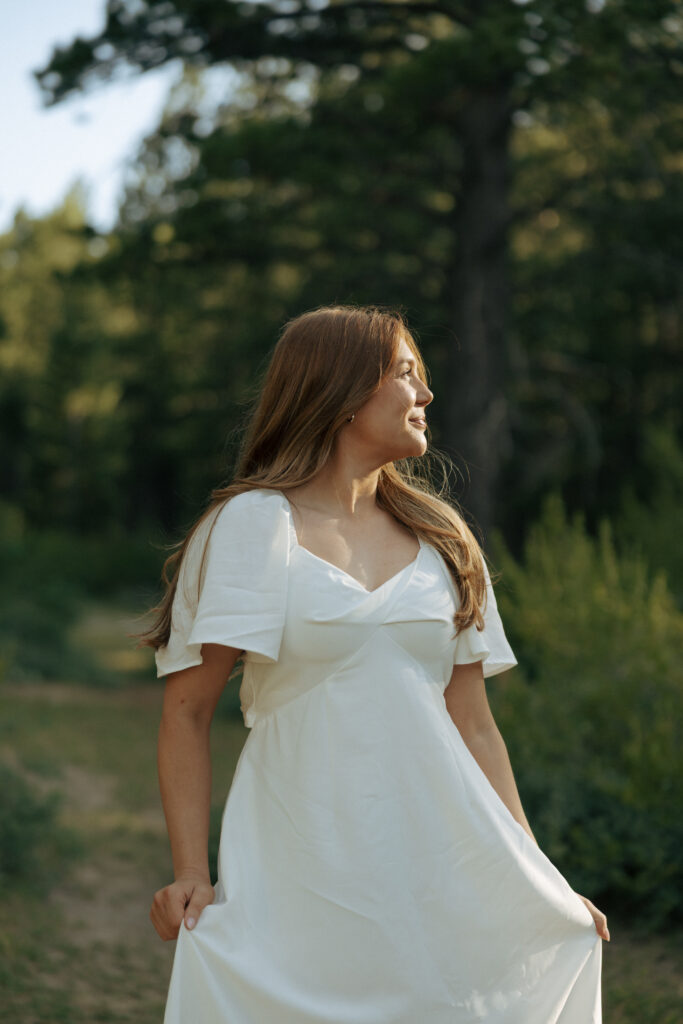 sunlight brightening womans face during engagement photos in las vegas