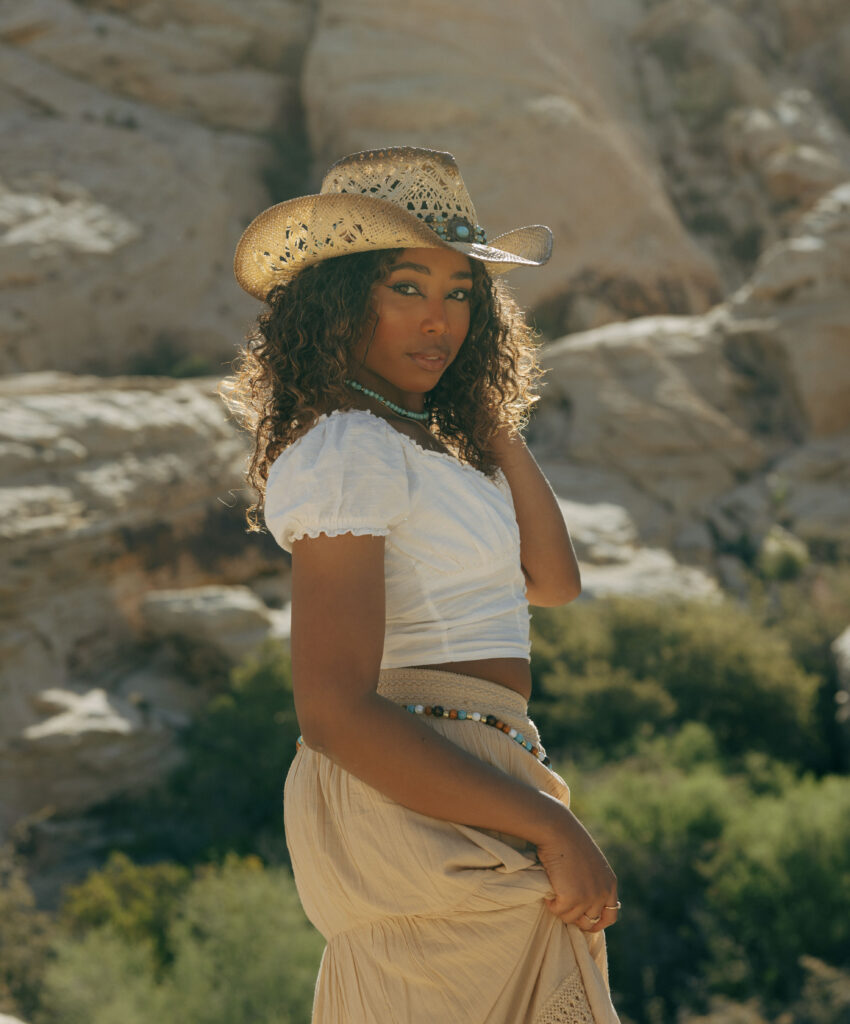woman looking directly at the camera during her las vegas desert photoshoot