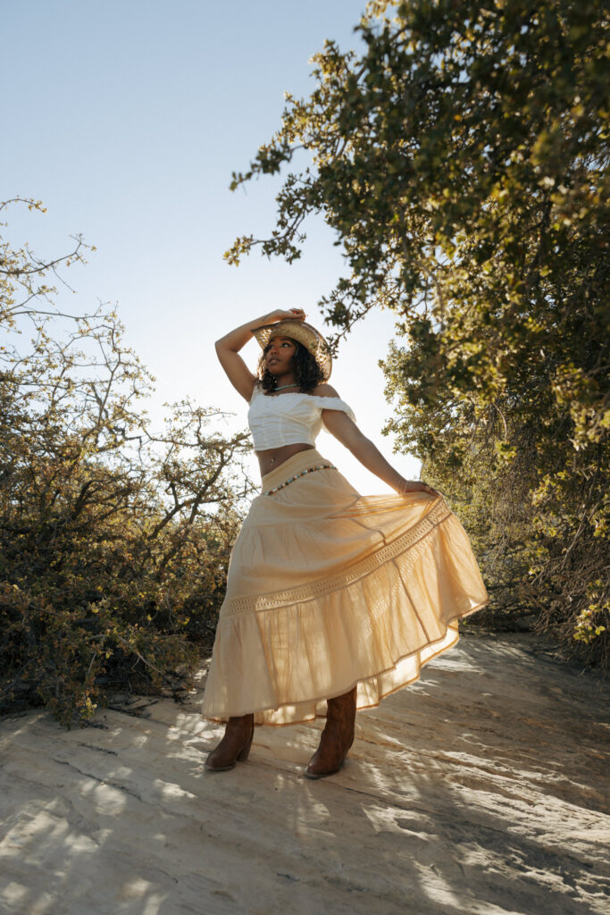 sunlight filtering in through a womans skirt