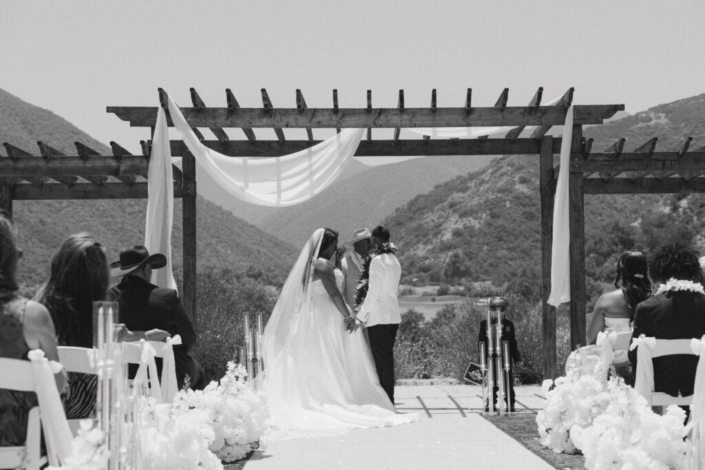 black and white image of wedding at eagle glen golf club wedding ceremony