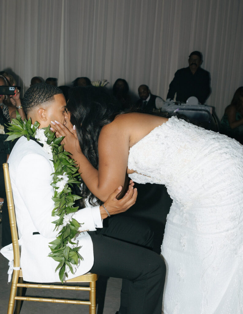 bride performing a lei dance for groom