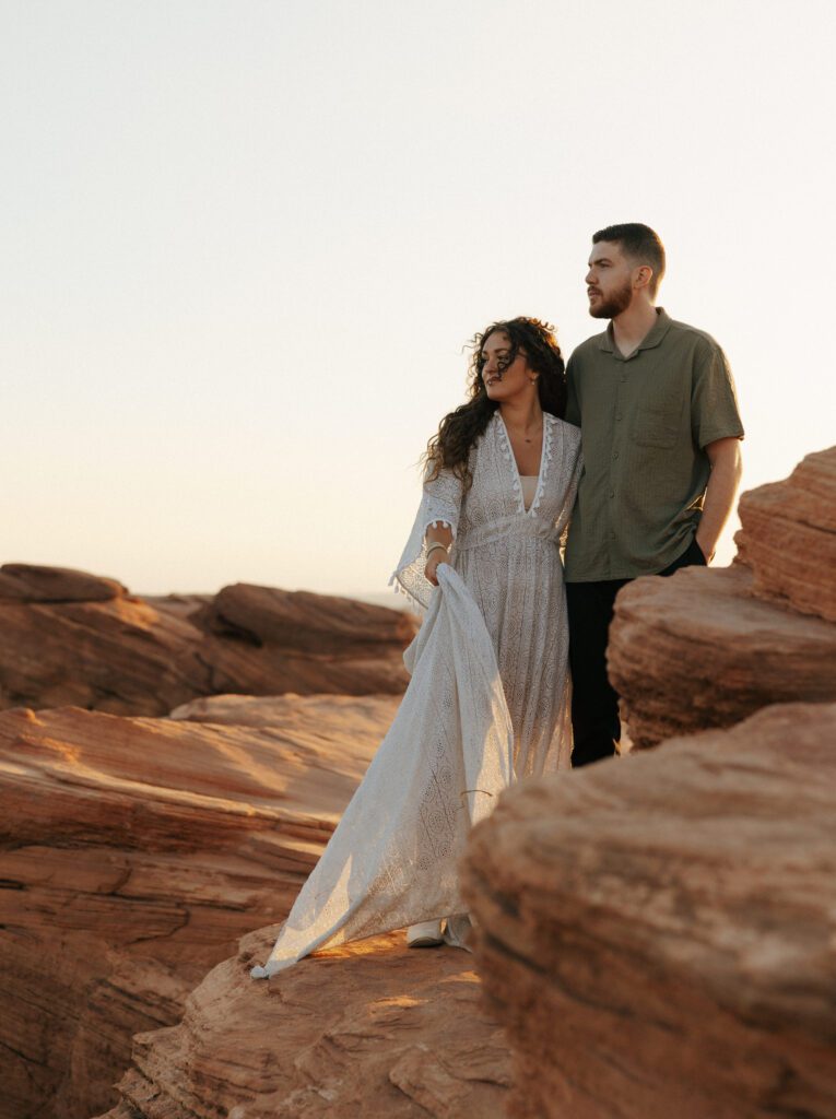 woman in a boho wedding dress posing in arizona