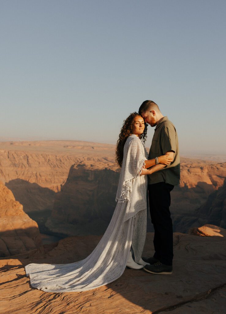 couple hugging at horseshoe bend
