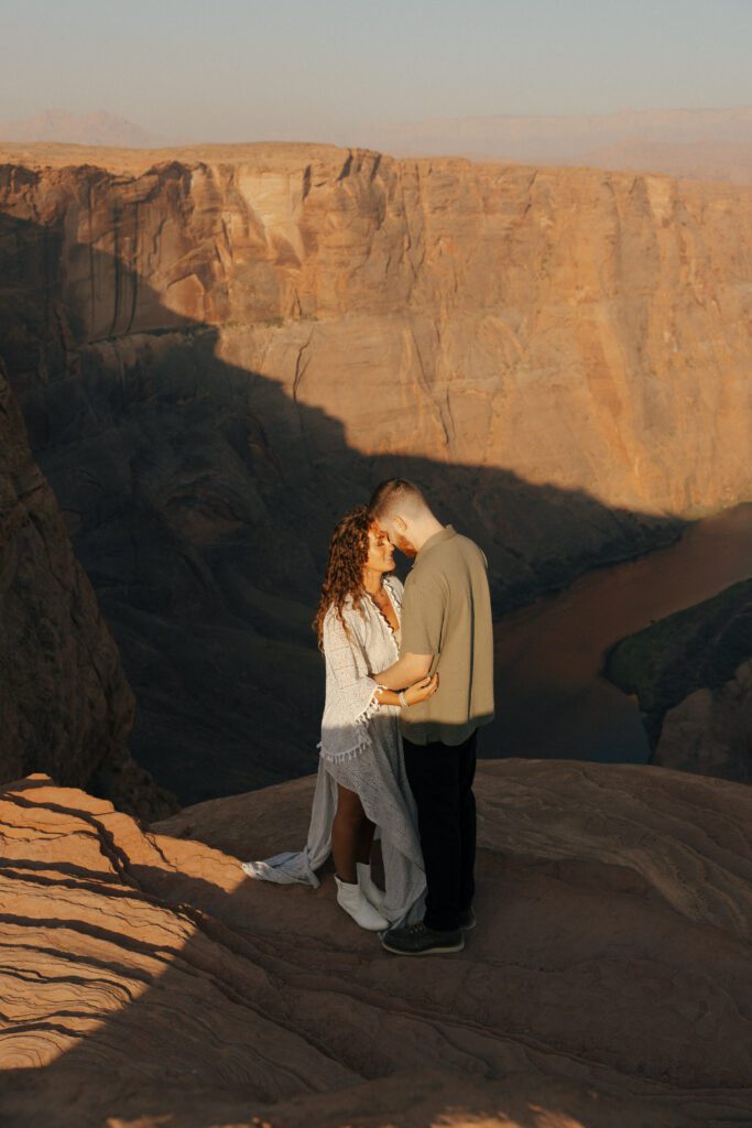 couple hugging at horseshoe bend
