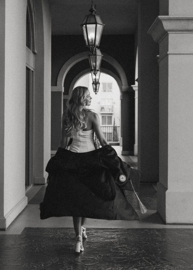 elegant image of a girl walking through arches at lake las vegas