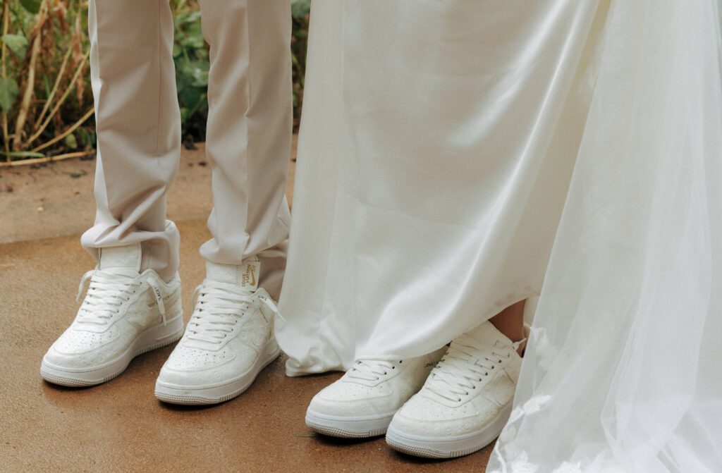groom and bride matching sneakers