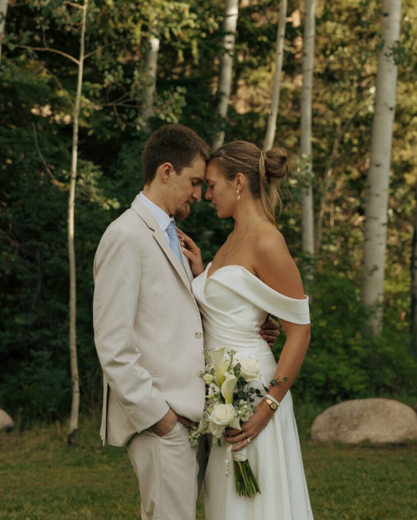 bride and groom sharing an intimate moment at their vail colorado wedding