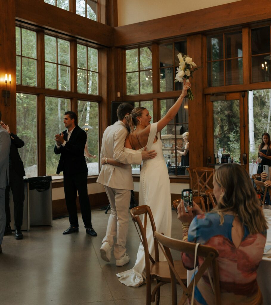 bride and groom grand entrance at donovan pavilion