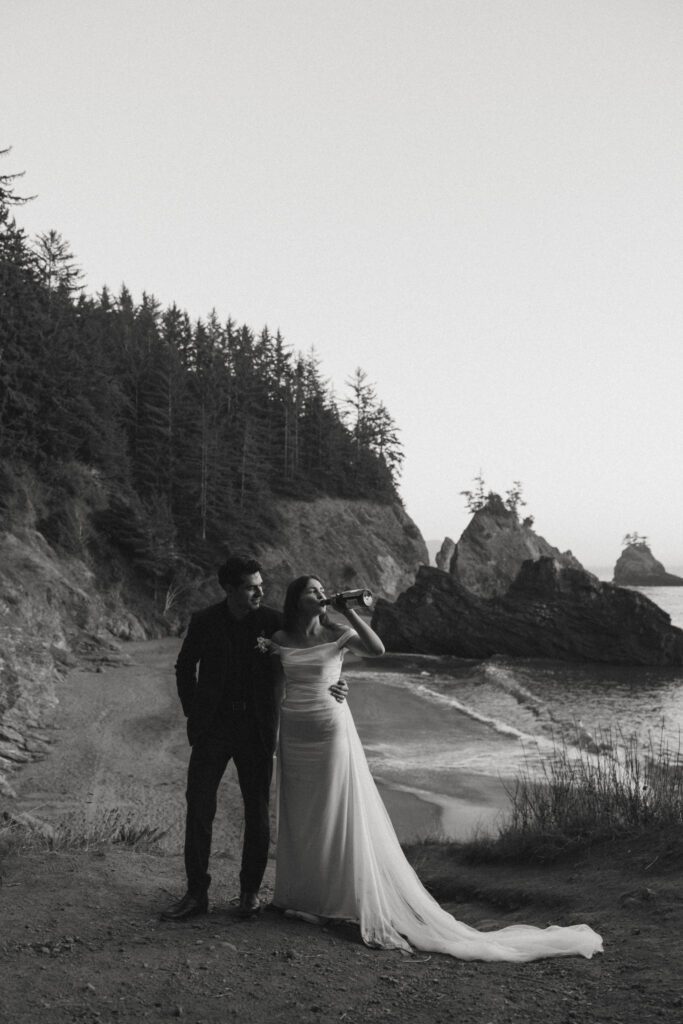 couple drinking champagne on oregon coast